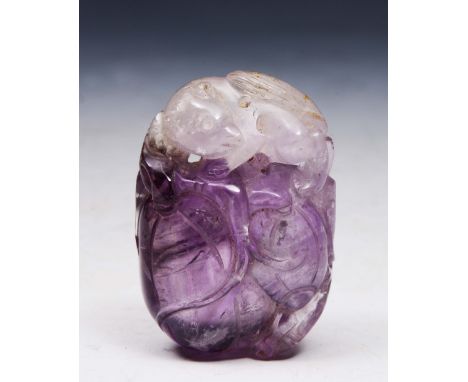 A CARVED AMETHYST PENDANT of rat and gourd form, 4cm