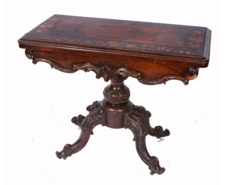 A VICTORIAN WALNUT AND MARQUETRY INLAID FOLD OVER CARD TABLE with green baize playing surface and on baluster column and four