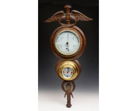 A CARVED OAK BAROMETER with circular dial signed John Nix late R. Walker, Eastbourne, with later added modern ships clock and