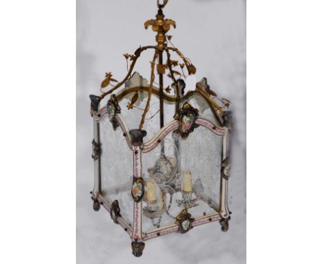 A FRENCH ENAMELLED AND GILT METAL HANGING LANTERN with painted and glazed sides and polychrome foliate decoration, 66cm high