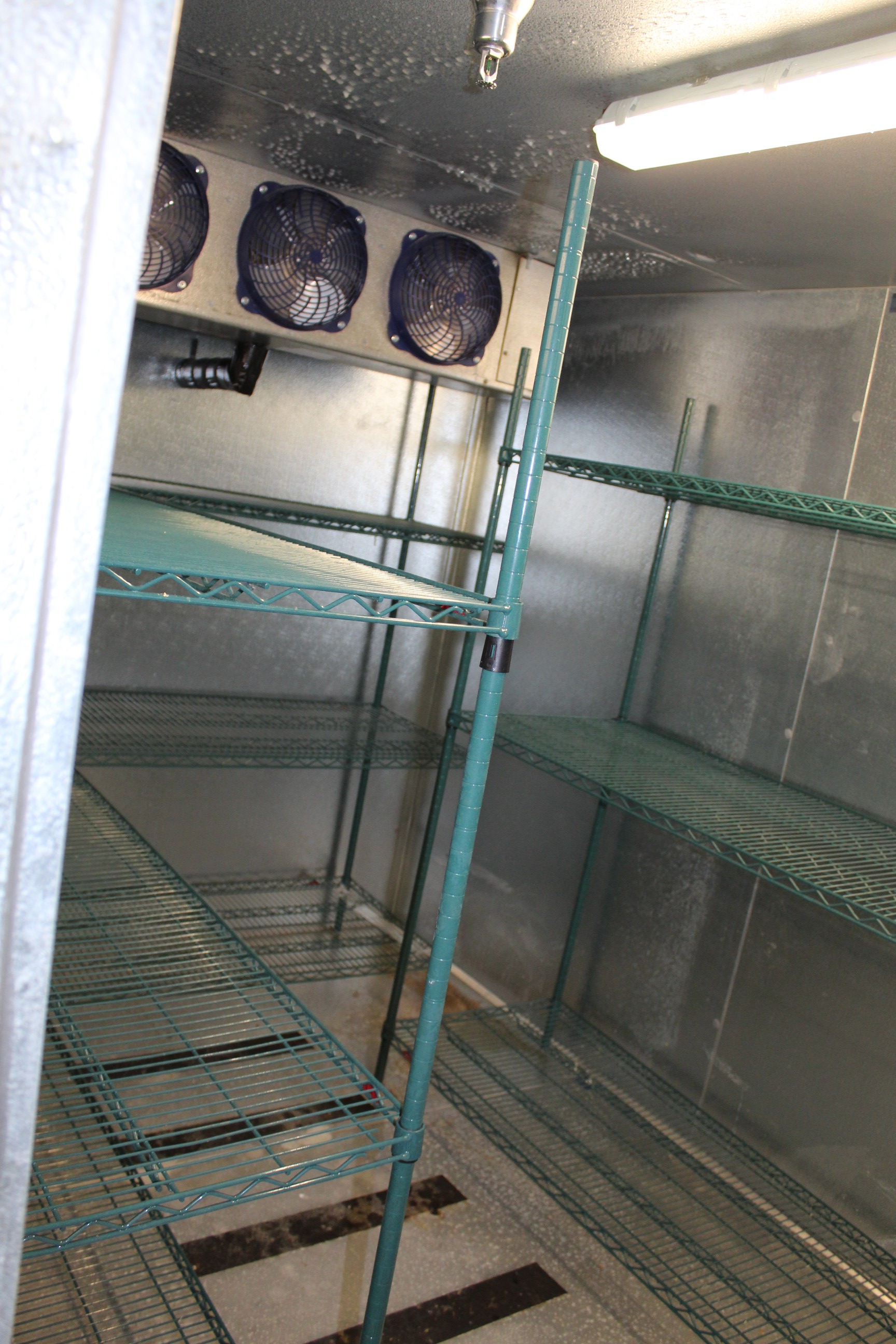 Contents of WalkIn Freezer (4) Sections of Adjustable Metal Shelving
