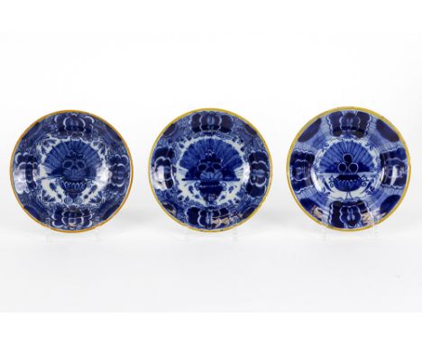 series of three small 18th Cent. plates in marked ceramic from Delft with a blue-white decorSerie van drie kleine achttiende 