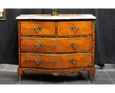 'antique' Louis XV style chest of drawers in rose-wood with mountings in bronze and with a marble top'Antieke' commode met ge