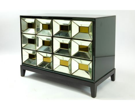 Olivier De Schrijver signed "Ducale" design cabinet with gold coloured cassettes and black mirror glass and with two doors an