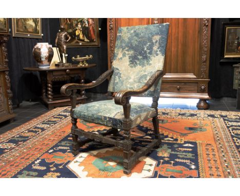 antique Louis XIV style armchair with typical carvings and with upholstery in antique tapestry from Aubusson Antieke Lodewijk