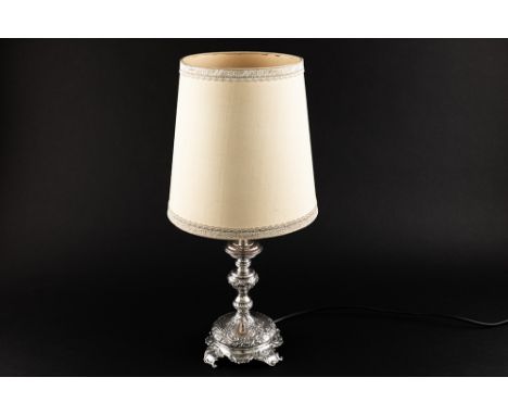 rococo style candlestick in marked silver, made into a lampKandelaar in gemerkt massief zilver met rococo ornamentiek, omgevo