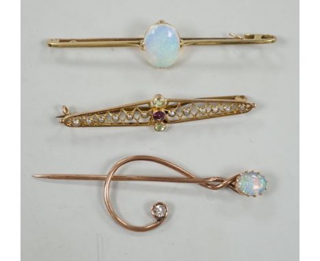 A novelty yellow metal, white opal and diamond set 'treble clef' stick pin, 60mm, a 15ct and white opal set bar brooch and on