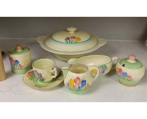 Clarice Cliff ‘Spring Crocus’: a tureen and cover, a cup and saucer, two jam pots, a sauce boat and cream jug (7)