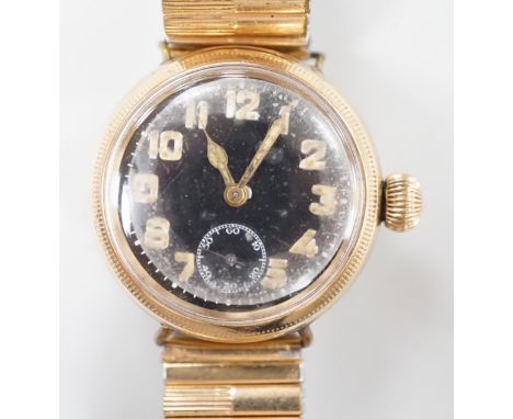 A gentleman's early 20th century 9ct gold Zenith military? manual wind wrist watch, with black Arabic dial and subsidiary sec