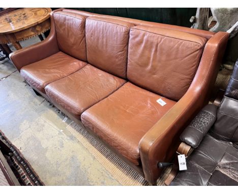 A mid century Danish tan leather sofa in the style of Borge Mogensen, length 182cm