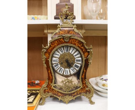 A French Louis XV style inlaid mantel clock, 56cm