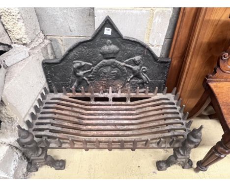 A cast and wrought iron fire grate, width 92cm, depth 42cm, with cast iron heraldic fire back, dogs and basket