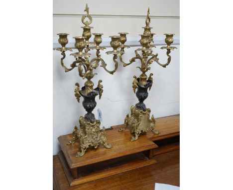 A pair of French brass five light candelabra, 58cm high