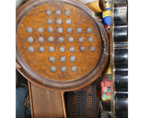 A selection of various games, to include a cribbage board, cards etc.