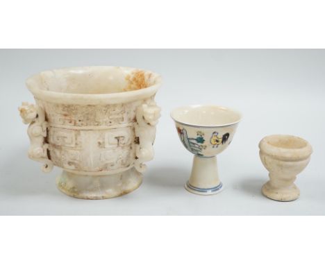 A Chinese burnt jade or hardstone censer, a stone cup and a doucai stem cup, censor 12cm high