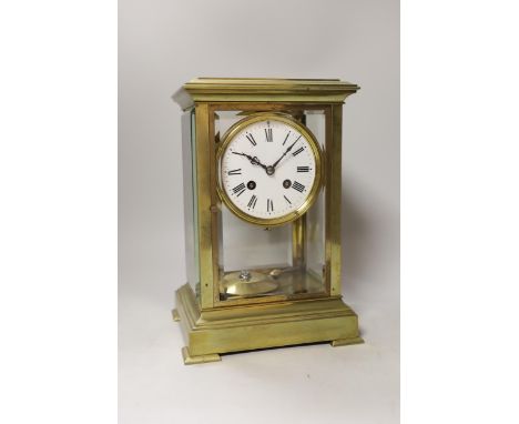 An early 20th century brass four glass mantel clock, 27cm