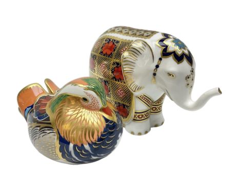 Two Royal Crown Derby paperweights, Imari Elephant, trunk raised with gold stopper and Mandarin Duck with silver stopper, bot