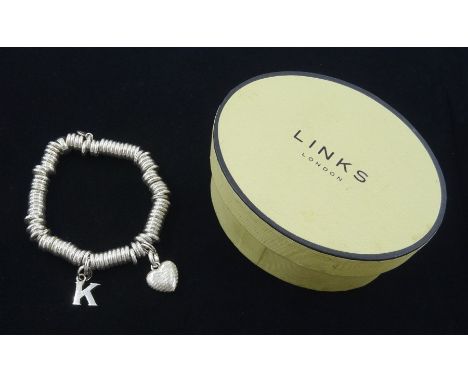 Links of London 'Sweetie' silver charm bracelet, with two silver charms, boxedCondition Report:Approx. 62gm