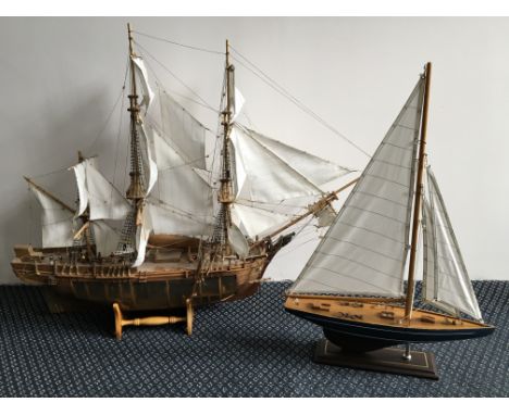 A model galleon together with a pond yacht.