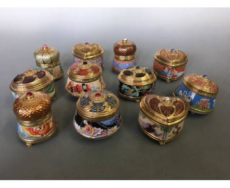 Eleven various music boxes decorated with stories including Petrouchka, Romeo and Juliet, The Nutcracker, Cinderella, The Fir