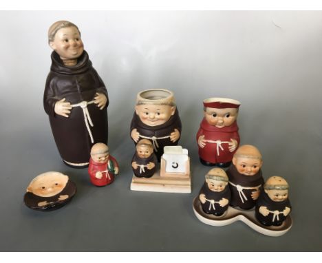 Approximately twenty nine Goebel monk figurines in red and brown, including jugs, cruet set, dish, egg cups, cork topper, lid