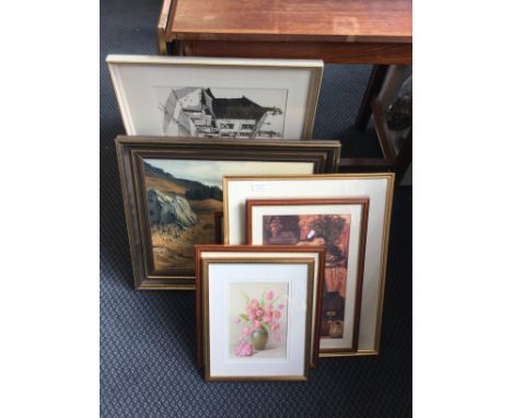 A selection of various paintings and prints.