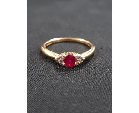 18 CARAT GOLD RUBY AND DIAMOND RING