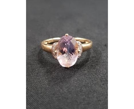 9 CARAT GOLD DIAMOND AND AMETHYST RING