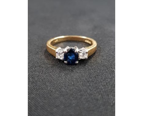 18C CARAT GOLD DIAMOND AND SAPPHIRE RING CIRCA 0.20 CARAT OFDIAMONDS