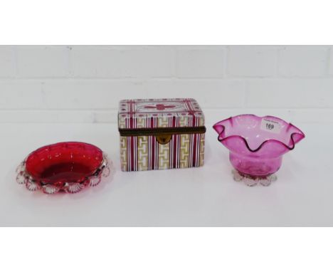 A cranberry glass bowl and dish, together with a flashed ruby glass brass mounted casket, (a/f), (3) 