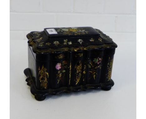 A black lacquered mother-of-pearl and abalone inlaid tea caddy, the hinged lid opening to reveal to lead lined compartments, 