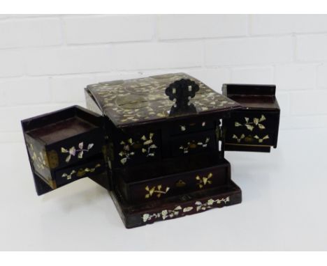 A Chinese rosewood and mother-of-pearl inlaid jewellery box, the lift up top with a fold away mirror to the interior, above a