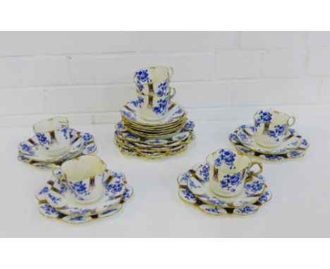 An Aynsley blue and white porcelain teaset comprising six cups, ten saucers and eleven side plates