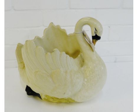 A white glazed ceramic swan planter