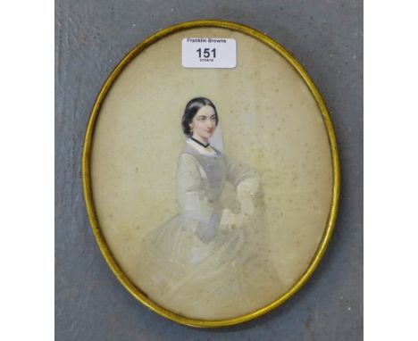 19th Century School  Oval watercolour and gouache portrait of a Young Woman, in a glazed gilt wood frame, apparently unsigned