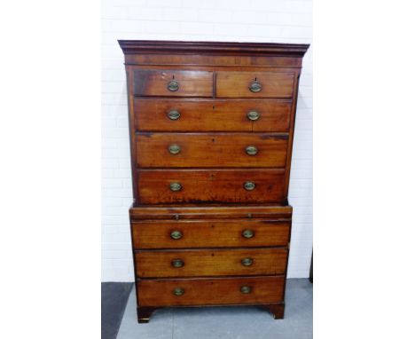 A Georgian mahogany chest on chest, the cornice top over two short and three long drawers, with a further three long drawers 
