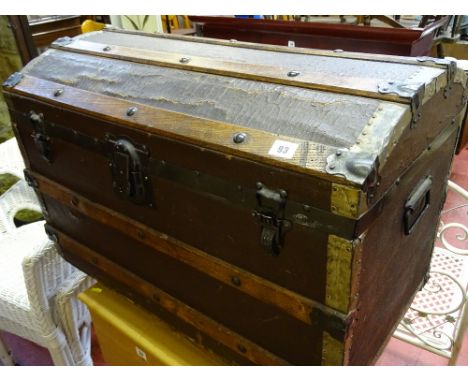 Vintage metal banded dome topped trunk with iron carry handles