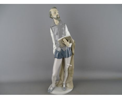 38 cms high Nao porcelain figurine of Don Quixote reading a book