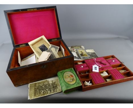 Victorian sewing box and contents including an enamel bird brooch, a vintage pocket watch key, family photographs, celebratio