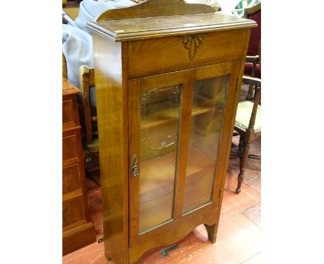 Small oak single door three shelf bookcase