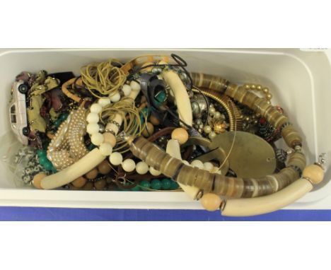 Tub of assorted costume jewellery to include: beads; necklaces; bangle; flask pendant on chain; assorted pearls; Lesney Rolls