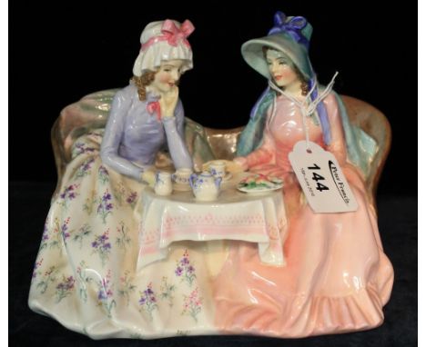 Royal Doulton bone china figure group: 'Afternoon Tea', HN 1747. CONDITION REPORT: Large hairline crack to base, which comes 