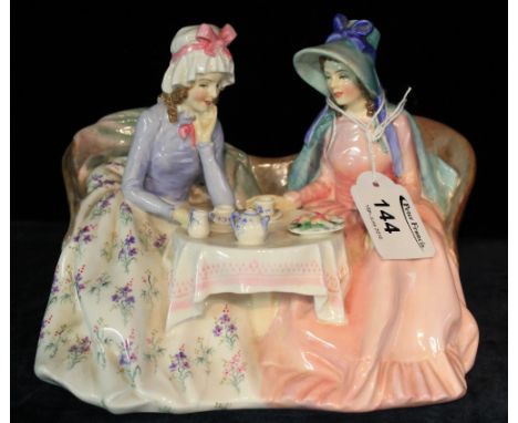 Royal Doulton bone china figure group: 'Afternoon Tea', HN 1747. CONDITION REPORT: Large hairline crack to base, which comes 