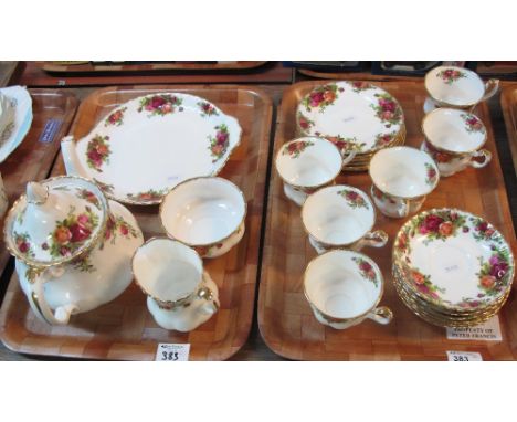 Two trays of Royal Albert 'Old Country Roses' bone china teaware items comprising: teapot; cups and saucers; milk jug; sucrie