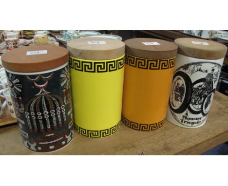 Four vintage Portmeirion canisters to include: 'Magic City'; 'Greek Key' and 'Velocipedes'. (4)  CONDITION REPORT: Chip to Ma