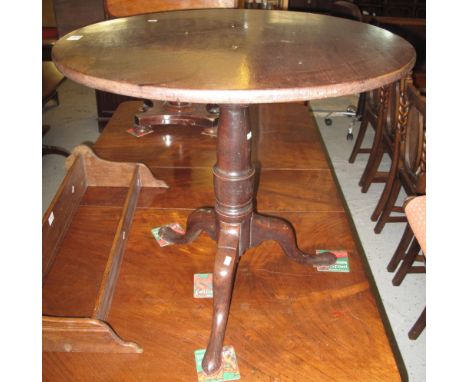 19th Century mahogany revolving bird cage tripod table with gun barrel pedestal.