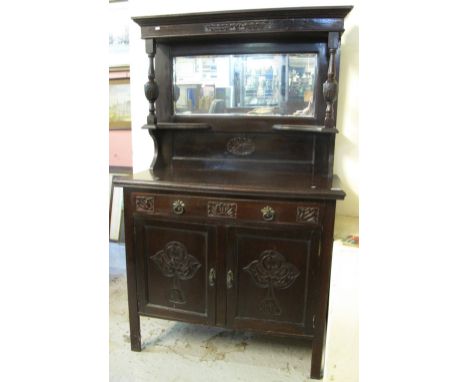 Edwardian stained and carved two stage, mirror back sideboard.