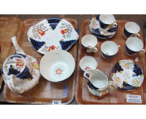 Two trays of 19th Century Gaudy Welsh 'Tulip' design teaware items to include: cups and saucers; milk jug; sucrier; teapot an