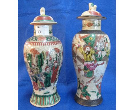 Two similar Chinese crackle glazed, enamel decorated, baluster shaped vases and covers. (2)