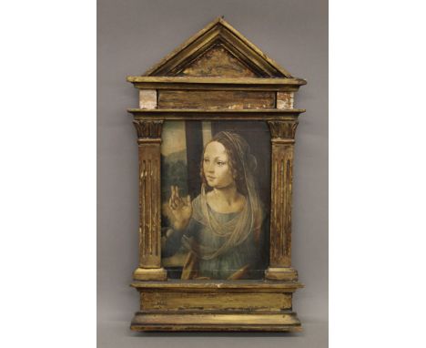 A Madonna icon print, housed in a temple formed framed. 26 x 47 cm overall.